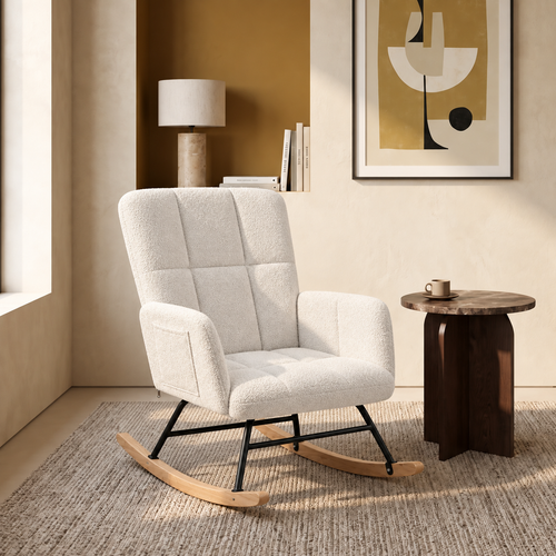 Fauteuil à bascule bouclette blanc Odette dans un salon