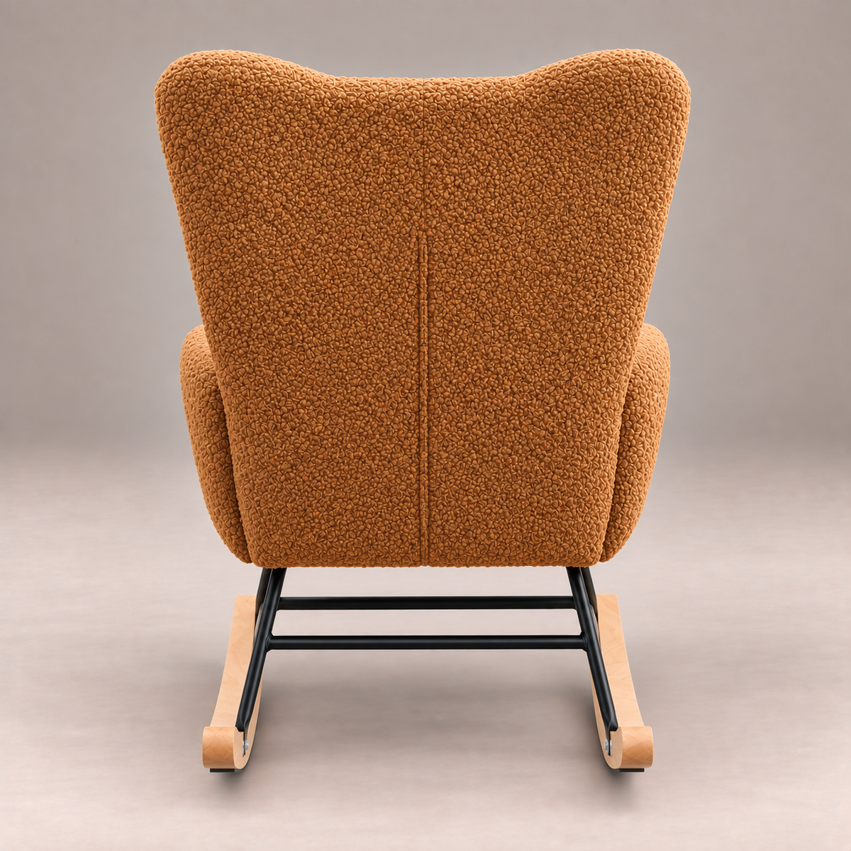 Dos capitonné du fauteuil à bascule Suzanne en bouclette cognac