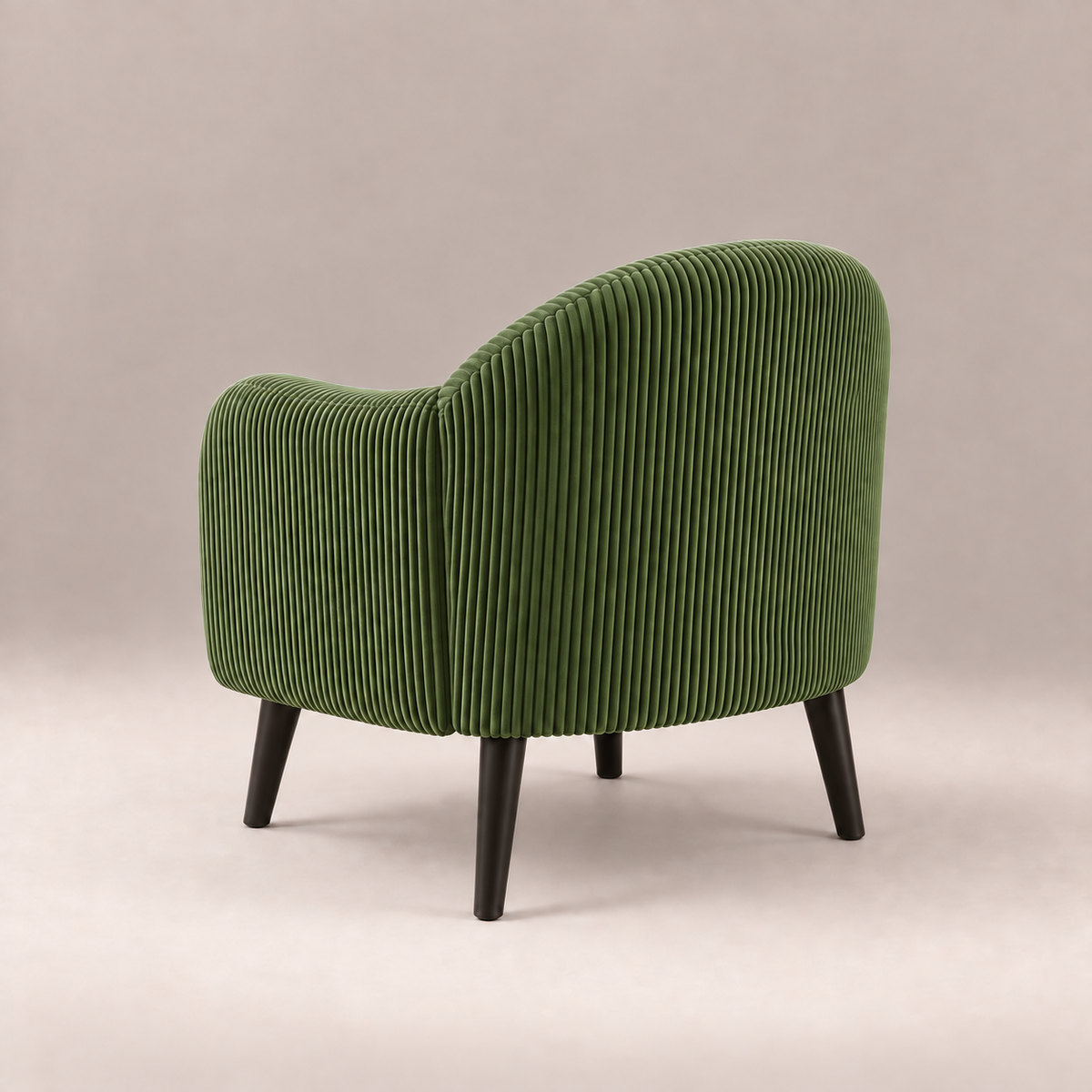 Dos arrondi du fauteuil Louise en velours côtelé vert
